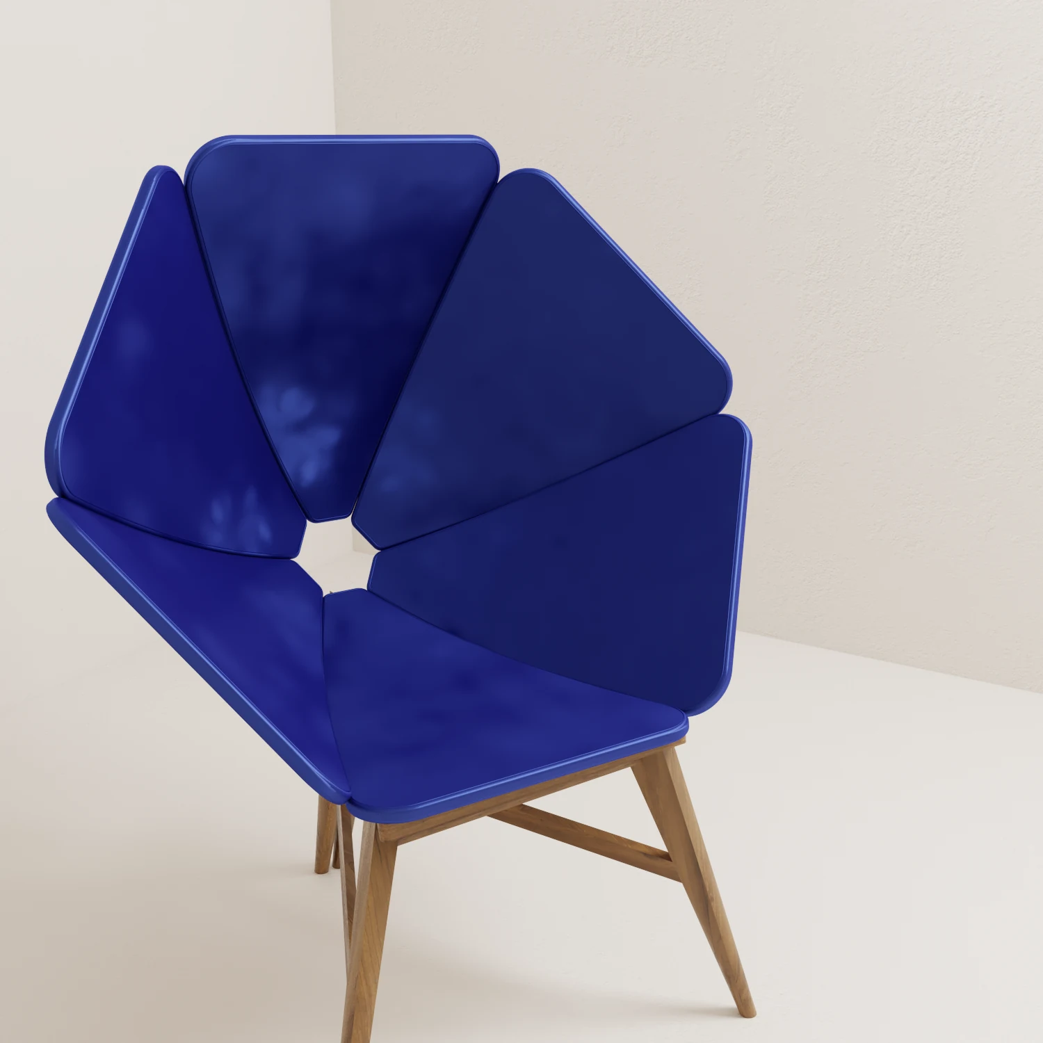 Close view of the lounge chair's blue petal-like panels, rounded edges and central opening.